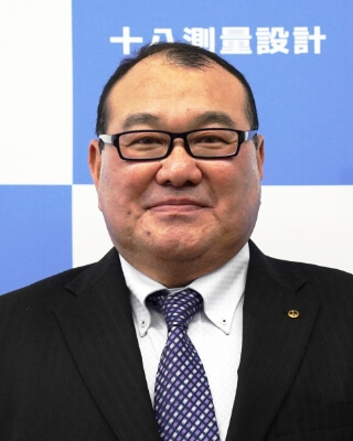 株式会社十八測量設計 代表取締役 冨永勝也